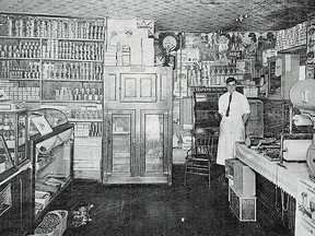 William Huzul stands beside the meat counter in Huzul's Groceries, which is set up as a general store for the neighbourhood.