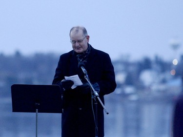 Pastor Jack Van de Hoef, of Bethel Christian Reformed Church, reads during Sunday's sunrise Easter service. (RONALD ZAJAC/The Recorder and Times)