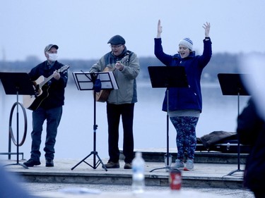 From left, Richard Hennessy, Paul Bullock and Beth Kent sing praise during an Easter sunrise service at Centeen Park on Sunday morning. (RONALD ZAJAC/The Recorder and Times)