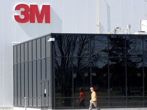 A worker is reflected in the expanded section of Brockville's main 3M plant on Wednesday morning. (RONALD ZAJAC/The Recorder and Times)