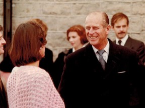 Prince Philip speaks to then Prescott mayor Sandra Lawn and her husband, Robert, during a visit to the Fort Town in 1984 in this photo provided by Sandra Lawn. (SUBMITTED PHOTO)