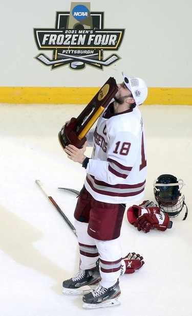 UMass captain and former Kemptville 73 Jake Gaudet kisses the NCAA Division I Championship trophy after the Minutemen defeating the St. Cloud State Huskies to win the championship game of the 2021 Frozen Four men's hockey tournament in Pittsburgh on Saturday.
Charles LeClaire-USA TODAY Sports
