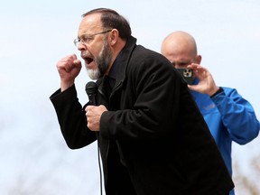 Pastor Henry Hildebrandt of Aylmer's Church of God, speaking at an anti-lockdown rally held in Chatham. (File photo)