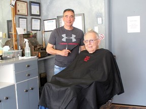 Bernard 'Bun' Lozon sits in the barber chair he bought brand new when he started his career. He retired on Tuesday, 68 years to the day he started working as a barber on April 6, 1953, with his dad Clarence Lozon. Bun's son, Jay Lozon, will now use his father's chair as he continues the family tradition continuing to operate Bun's Barber Shop in downtown Wallaceburg. Ellwood Shreve/Chatham Daily News/Postmedia Network
