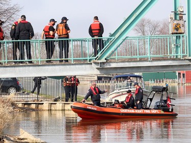 Chatham-Kent Fire & Emergency Services and Chatham-Kent police officers were out in full force to search for a body that was later recovered from the Sydenham River near the foot bridge in Wallaceburg, Ont. on Wednesday April 7, 2021. Ellwood Shreve/Chatham Daily News/Postmedia Network