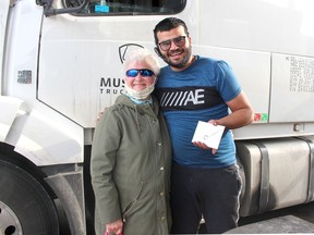 Trucker Rupinder Sohi of Edmonton said he was thrilled to receive a thank you note from Chatham resident Beverly Perrin. Perrin and her husband Richard have been handing out thank you cards to truckers since last April.(Ellwood Shreve/Chatham Daily News)