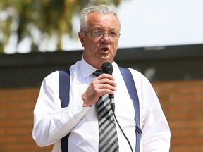 Independent MPP Randy Hillier speaks at an anti-lockdown protest at Tecumseh Park in Chatham, Ont., on Monday, one day after a similar event at a church in Aylmer, Ont., led to charges against six people, including Hillier.
