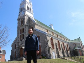 Rev. Jonathan Blake, in front of St. Finnan's Basilica on Friday. Photo on Friday, April 9, 2021, in Alexandria, Ont. Todd Hambleton/Cornwall Standard-Freeholder/Postmedia Network