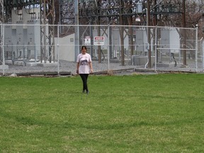 Cornwall resident Brenda Lee Villeneuve, near a mysterious circle in a field in the east end of the city. Photo on Wednesday, April 14, 2021, in Cornwall, Ont. Todd Hambleton/Cornwall Standard-Freeholder/Postmedia Network