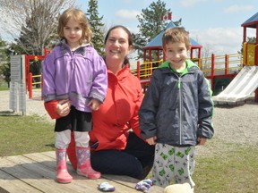 Anne Mallet, along with kids Véronique and Nicholas, were happy to enjoy some sunshine on Sunday, April 18, 2021 at Lamoureux Park's play structure. in Cornwall, Ont. Francis Racine/Cornwall Standard-Freeholder/Postmedia Network