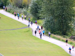 After running down the hill from Mitford Park, these 2019 Terry Fox Run entrants head east past the dog park into Riverfront Park. Patrick Gibson/Cochrane Times