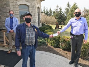 Jay McFarlan, Huron Hospice Board Chair (left), Draw #1 winner Tom Barry (centre) and Willy Van Klooster, Huron Hospice Executive Director. Submitted