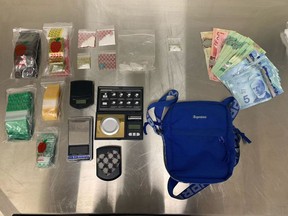 Drugs, a scale and packaging supplies were seized from a vehicle by Ontario Provincial Police in Quinte West on Monday morning.