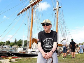 Staff, volunteers and summer students of the brigantine St. Lawrence II gathered at Portsmouth Olympic Harbour on Aug. 21, 2020, to honour Francis MacLachlan, front. He designed and built the tall ship St. Lawrence II in 1953 and was its first captain. MacLachlan died on April 18, 2021, at the age of 95.