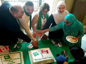 Members of the executive of the Canada Pakistan Association of Kingston, including past-president Zermaan Khan, second from left, at a 2019 function at City Hall.