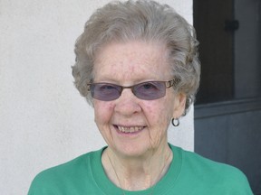 Jean Morris, wearing a 4-H t-shirt, pins and a special necklace, received the prestigious 4-H Ontario Arbor Award, a hand crafted metal sculptured tree, in a virtual ceremony March 26. ANDY BADER/MITCHELL ADVOCATE