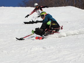 Photo by PAUL KAZULAK/FOR THE STANDARD
Diane Morrell, a sit skier from Sault Ste. Marie, and her son Benny, skied at Mount Dufour Ski Area a number of times this past winter after adaptive equipment they needed was acquired.