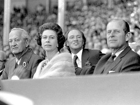 Queen Elizabeth and Prince Philip are pictured in Calgary in 1973, with Pierre Trudeau in background. PHOTO BY FILE PHOTO /Provincial Archives of Alberta