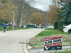 A lawn sign on 6th Avenue West in Owen Sound asks drivers to slow down. City staff is recommending several blocks of the street serve as a pilot location for traffic-calming measures due to concerns about drivers travelling at excessive speeds. 
(DENIS LANGLOIS/The Sun Times)