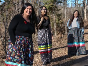 Sheena Bradley of McMurray Métis, Stephanie Fedirchuk of Takla Lake First Nation, and Shelby Weiss of Sturgeon Lake Cree Nation pose for a photo at the Eagle Ridge section of the Birchwood Trails on Friday, April 16, 2021. Sarah Williscraft/Fort McMurray/Postmedia Network