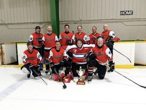 Clouthier Construction is the A champion of the Tuesday Night Hockey League. Team members are (front from left) Jamie Chartrand, Kenny Belanger, Trevor Chester, Scott Tripp and (back from left) Kirk Ventress, Geoff Clouthier, Brian Burgoyne, Perry Turcotte, Ryan Barrett and Cory King. Missing are Dan Shields, Chris Drew and Kerry Clouthier.