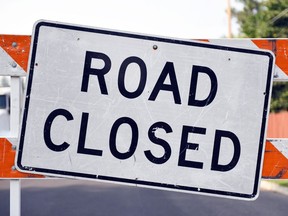 Horizontal shot of a road closed sign.

Not Released (NR)