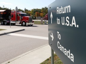 A truck leaves the Canada-United States border crossing