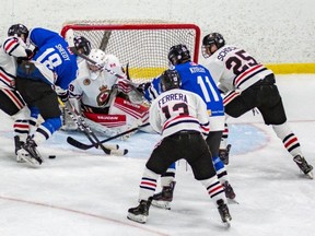 Sarnia goalie Nolan DeKoning makes one of 48 saves as the Legionnaires battled the London Nationals in GOJHL hockey action at Sarnia Arena on February 28, 2020. (Photo by Shawna Lavoie)