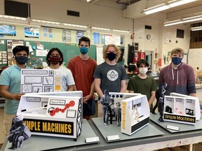 From left, Grade 12 Northern Collegiate students Ketan Vashisht, Om Patel, Anthony Smith, Reid Robinson, Michael
Atanasov and Brett Howard are shown with scale models of simple machine exhibits they designed and built for the Oil Museum of Canada.