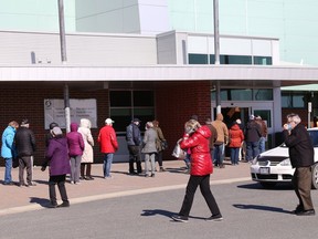 Community members attend a vaccination clinic at the Gerry McCrory Countryside Sports Complex in Sudbury, Ont. on Thursday April 1, 2021. John Lappa/Sudbury Star/Postmedia Network