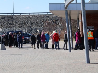 Community members attend a vaccination clinic at the Gerry McCrory Countryside Sports Complex in Sudbury, Ont. on Thursday April 1, 2021. John Lappa/Sudbury Star/Postmedia Network