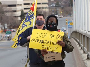 Laurentian and its federated universities' students, alumni, faculty, staff and community members, organized as Save Our Sudbury, participated in a rally in Sudbury, Ont. on Tuesday April 6, 2021. Despite the protests, Laurentian is moving ahead with program and job cuts, which could take as much as $150 million ot of the city's economy, one economist says. John Lappa/Sudbury Star/Postmedia Network