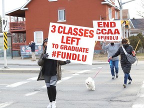 Laurentian and its federated universities' students, alumni, faculty, staff and community members, organized as Save Our Sudbury, participated in a rally in Sudbury, Ont. on Tuesday April 6, 2021. They were demonstrating their opposition to a restructuring plan, which is expected to 'decimate' programs at the university. John Lappa/Sudbury Star/Postmedia Network