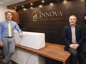 Jean-Francois Demore, left, and Cliff Richardson of Innova Wealth Partners in Sudbury, Ont.
