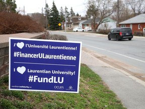 Signs have been popping up in Sudbury, showing support for students, staff and faculty at Laurentian University.