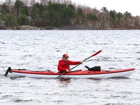 A kayaker skims across the water at Ramsey Lake in Sudbury, Ont. on Wednesday April 14, 2021. John Lappa/Sudbury Star/Postmedia Network