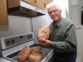 Garth Wunsch, of Lively, displays traditional European sourdough bread he made on April 15.