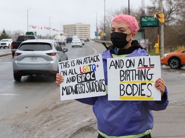 A protester takes part in a rally to fight Laurentian University program closures in Sudbury, Ont. on Friday April 16, 2021. John Lappa/Sudbury Star/Postmedia Network