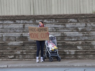 A protester takes part in a rally to fight Laurentian University program closures in Sudbury, Ont. on Friday April 16, 2021. John Lappa/Sudbury Star/Postmedia Network