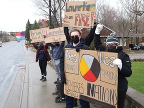 Protesters take part in a rally to fight Laurentian University program closures in Sudbury, Ont. on Friday April 16, 2021. John Lappa/Sudbury Star/Postmedia Network