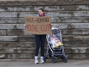 A protester demands the removal of Laurentian president Robert Hache and colleges and universities minister Ross Romano during a protest in Sudbury on April 16.