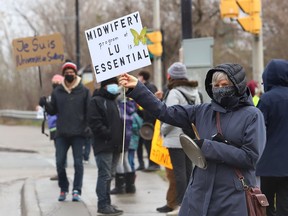 Protesters take part in a rally to fight Laurentian University program closures in Sudbury, Ont. on Friday April 16, 2021. John Lappa/Sudbury Star/Postmedia Network