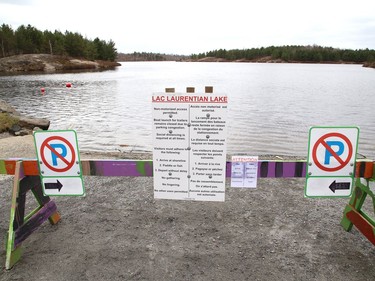 COVID-19 rules are posted At Lake Laurentian on Tuesday.