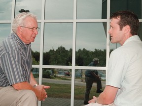 Geoff Tesson chats with first-year Northern Ontario School of Medicine resident Ian Symington in 2001.