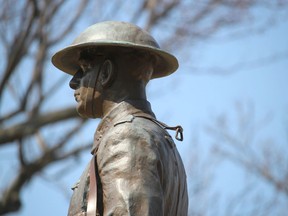 Sarnia police are investigating damage to the statue on the Cenotaph in the city's Veterans Park. A copper rifle has been removed from the bronze statue of a soldier. (Paul Morden/Sarnia Observer)