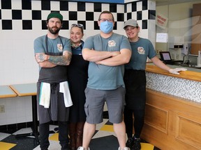 Happy Jack's Galley owner Jack Clift, second from right, is surrounded by his crew in the eatery's new 1403 Michigan Ave. space. (Carl Hnatyshyn/Sarnia This Week)