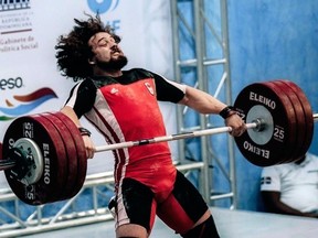 Boady Santavy of Sarnia competes at the Pan American senior weightlifting championships in Santo Domingo, Dominican Republic on April 22. He won a silver medal and qualified for the Tokyo Olympics. (Contributed Photo)