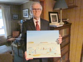 Ontario Superior Court Justice Joseph Donohue holds a painting depicting life during an earlier time in Kugluktuk, Nunavut in this file photograph from March 2015. Donohue has made seven trips to Nunavut where he is a volunteer deputy judge. The long-serving justice is retiring. Paul Morden/Postmedia Network