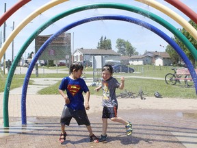 Jeremiah Wawrzaszek, left, with his brother Josiah are seen here last year keeping cool in the splash pad at White Water Park in South Porcupine as the temperature on June 17, 2020 had reached a high of 33 C. Timmins city council this week approved a $395,000 contract to provide upgrades to the splash pad in South Porcupine.

RICHA BHOSALE/The Daily Press