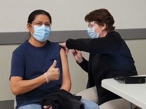 Xavier Kataquapit, a member of Attawapiskat First Nation and an urban Indigenous resident of Kirkland Lake, received his first shot of the Moderna vaccine from Sandra Dalpai, nurse practitioner with the Kirkland Lake Family Health Team, at a vaccination clinic held by the Timiskaming Health Unit in Kirkland Lake on Thursday, April 15. 

Supplied